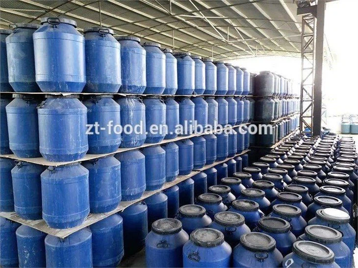 Factory drum packing white mushroom in brine